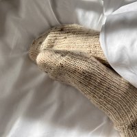 Beige knitted socks with elastic band pattern