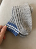 Gray socks with elastic band pattern